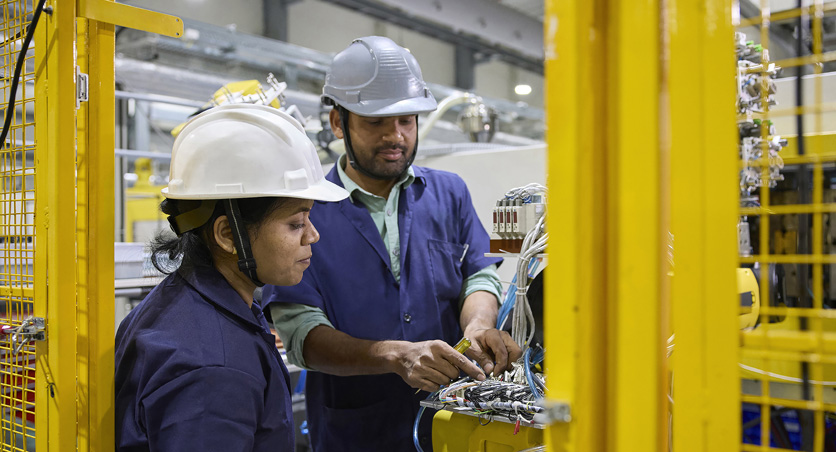 Robotics training inside an Apple supplier manufacturing environment in India