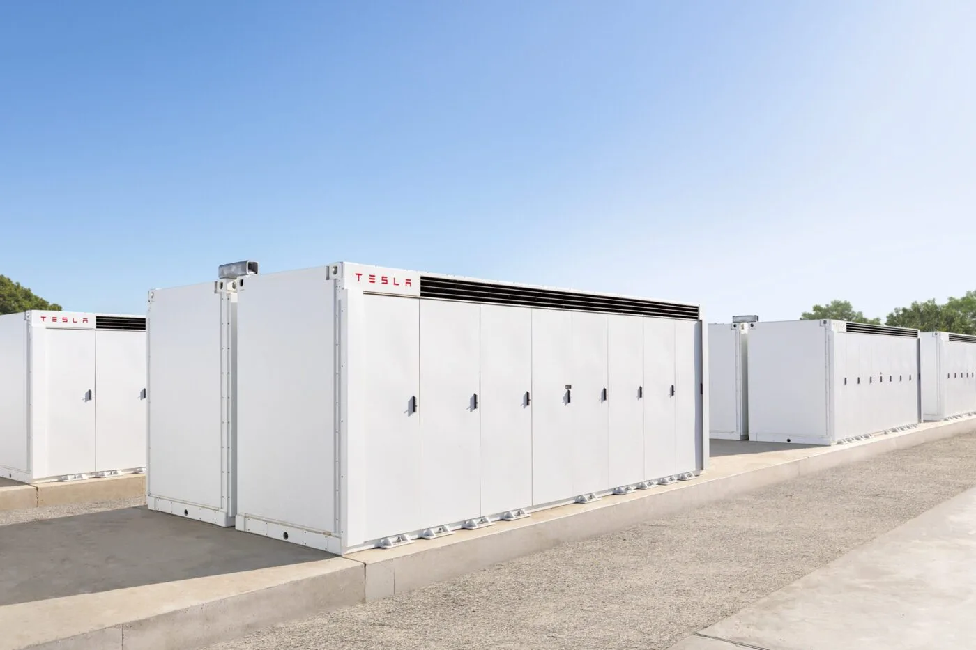 Rows of Tesla Megapack utility-scale battery storage units
